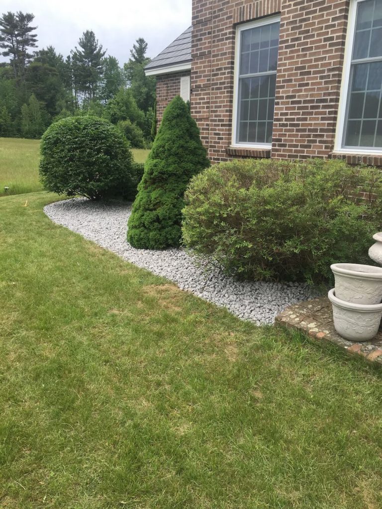 Crushed stone, weed mat, different hedge trim